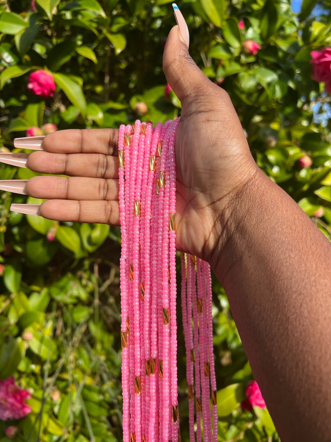 Pink african waist beads. Close up