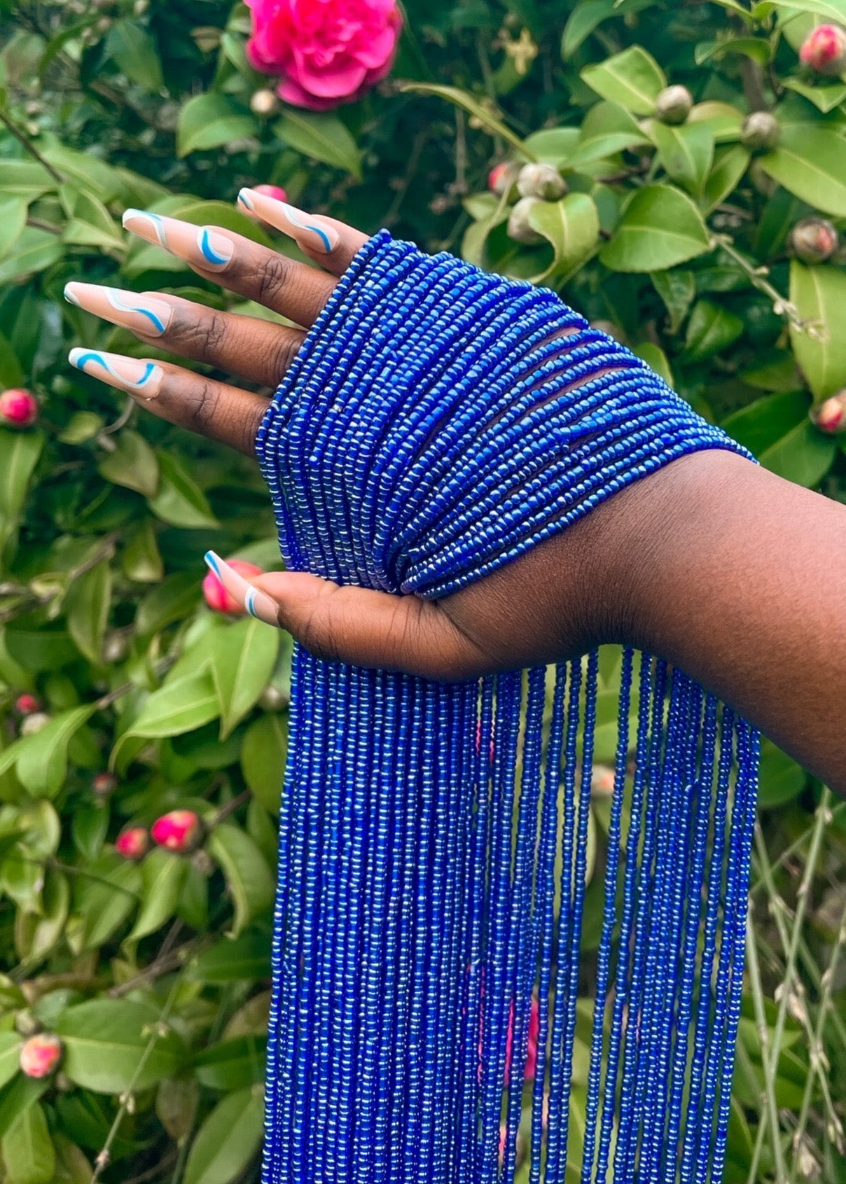 Blue waist beads. Front view