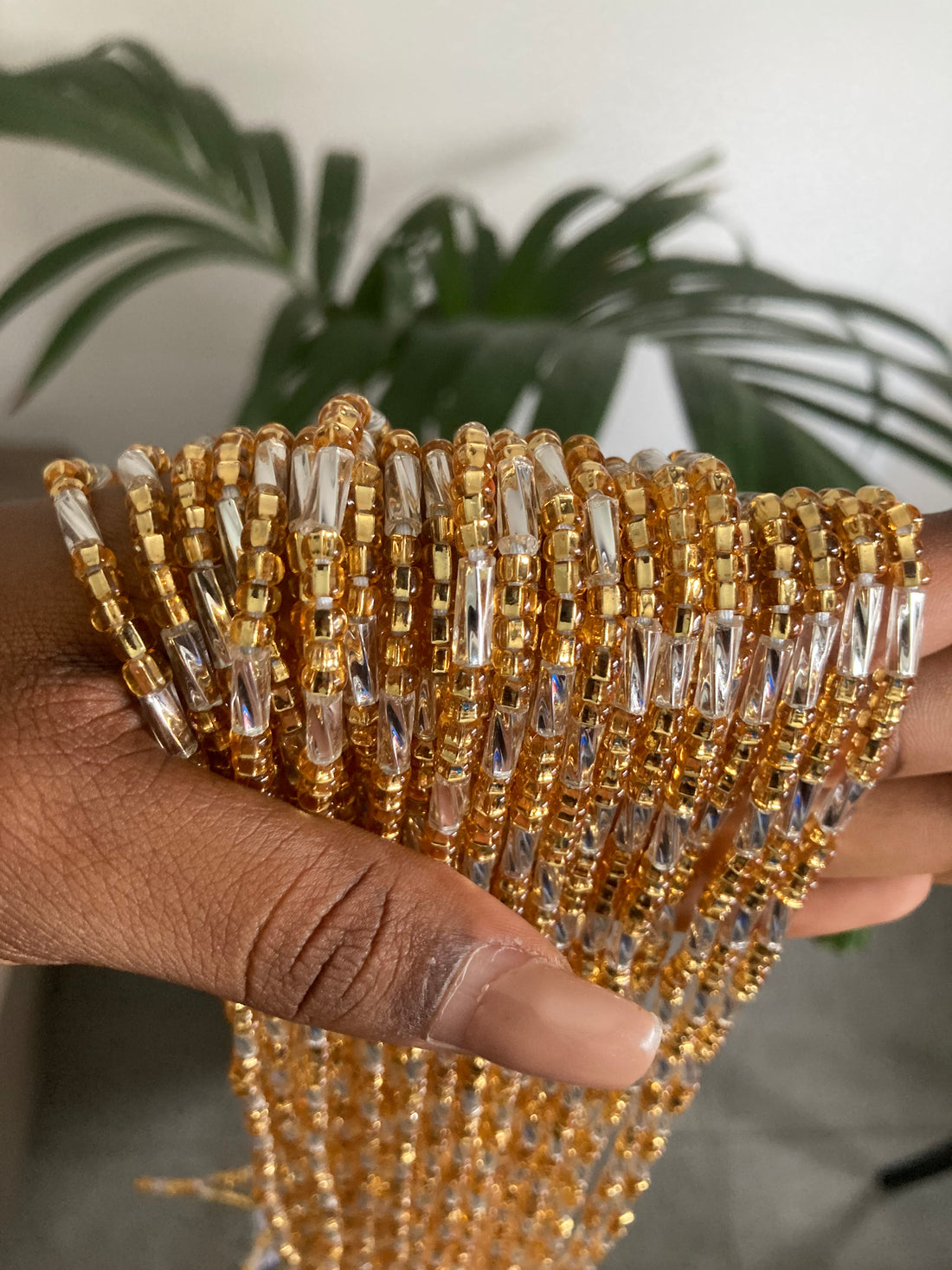 gold and silver waist beads. Close up